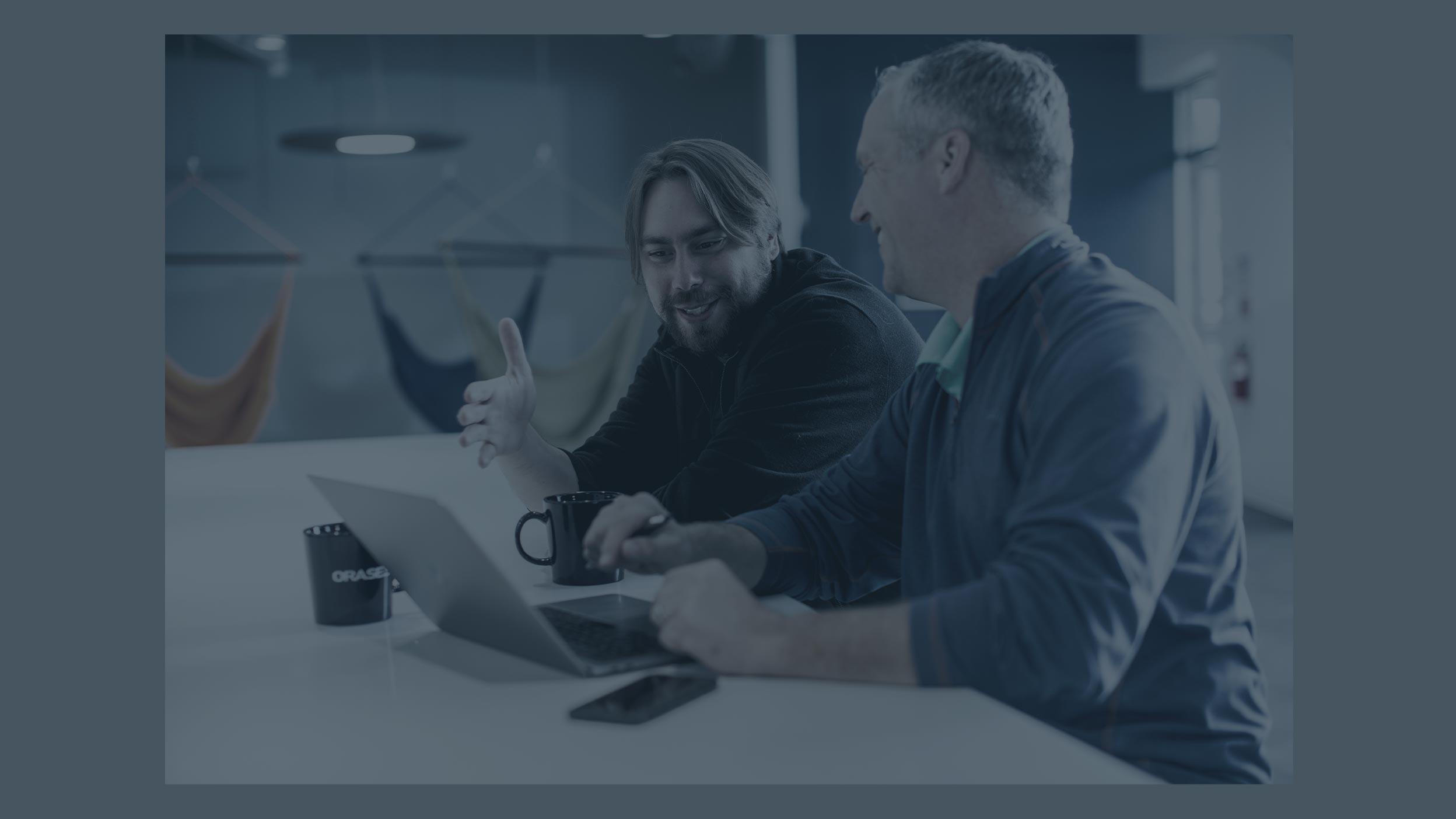 Orases Software Developers Discussing Client Deliverables